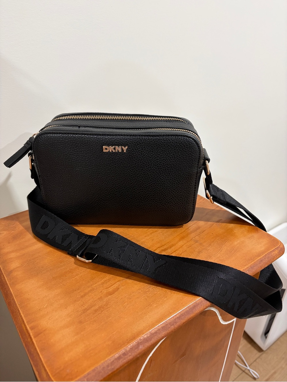 DKNY Black pebbled Leather Belt camera Bag with Gold Hardware